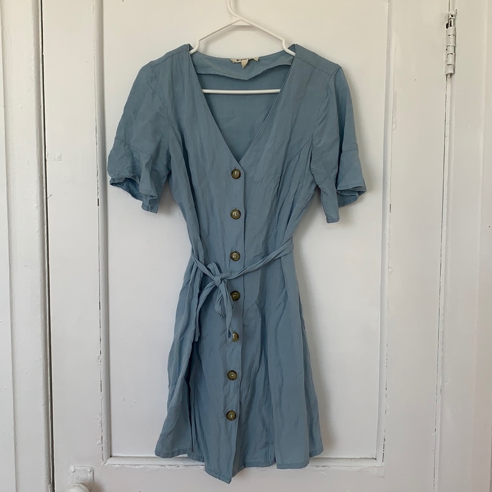 Blue dress with buttons in the middle.